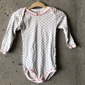 White onesie with blue dots